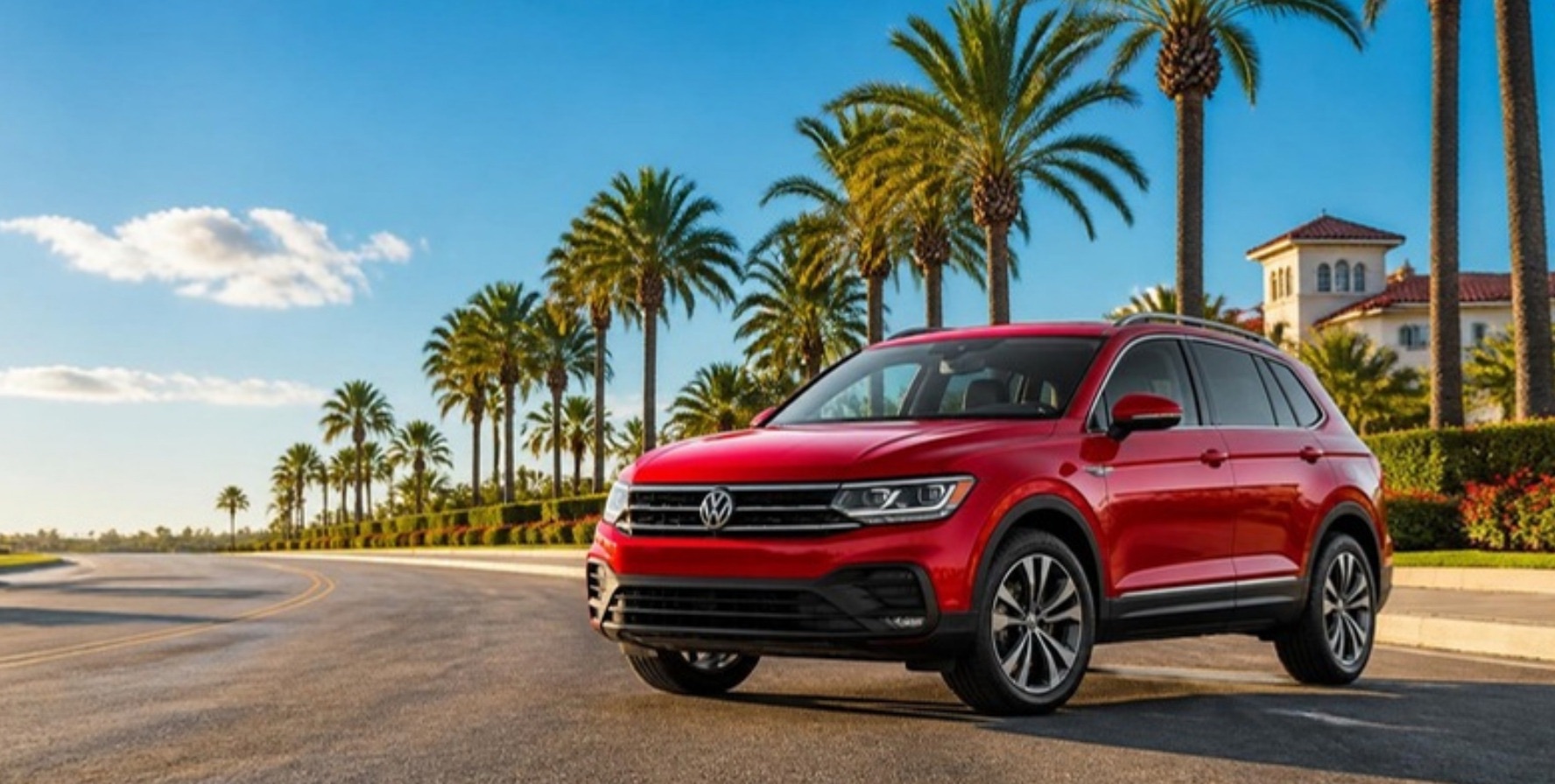 Volkswagen Tiguan vermelho em avenida com palmeiras
